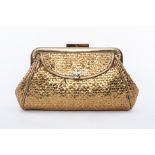 AN ANYA HINDMARCH 'LIBERTINE' GOLD LEATHER CLUTCH