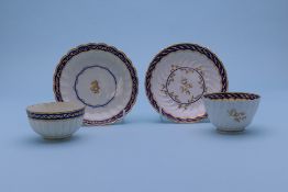 TWO TEA BOWLS AND SAUCERS