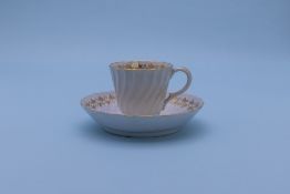 TWO CUPS AND SAUCERS