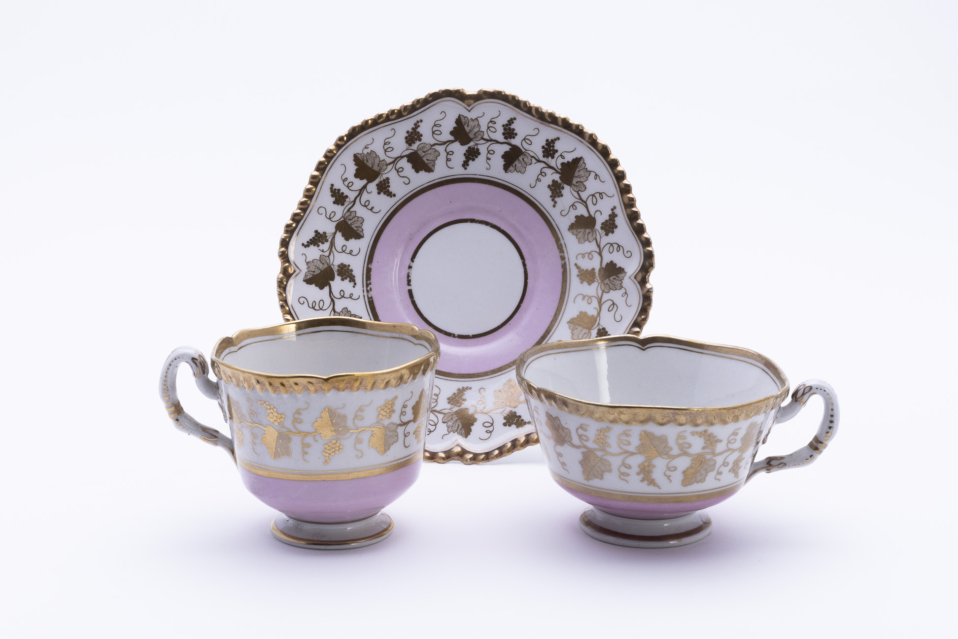 TWO PORCELAIN TRIOS