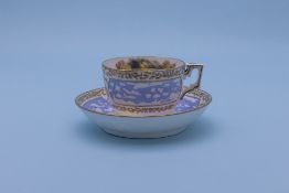 A MILES MASON TEA CUP AND SAUCER