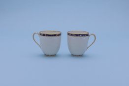 A PAIR OF CROWN DERBY COFFEE CUPS