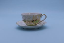 A GROUP OF THREE TEA CUPS AND SAUCERS