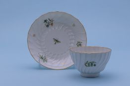 TWO TEA BOWLS AND SAUCERS