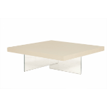 A WHITE SQUARE COFFEE TABLE