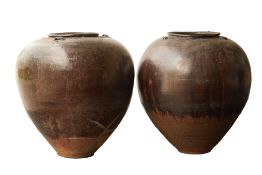 A PAIR OF LARGE TERRACOTTA JARS