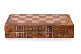 A LEATHER BOUND BOOK FORM CHESS AND BACKGAMMON BOARD