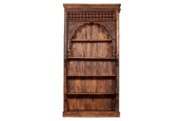 A TALL ANTIQUE DOORWAY ARCH CONVERTED INTO A BOOKCASE (2)