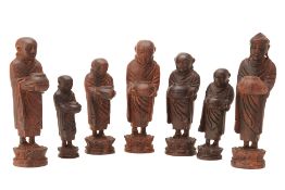 A SET OF BURMESE CARVED WOOD MONKS