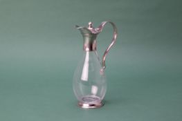 AN ITALIAN PEWTER MOUNTED GLASS CLARET JUG