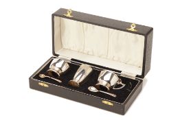 AN ART DECO STYLE THREE PIECE SILVER CONDIMENT SET