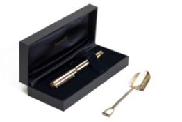 A TIFFANY & CO SILVER FOUNTAIN PEN AND NOVELTY SILVER SHOVEL