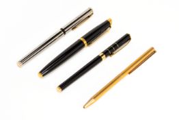 A GROUP OF FOUR BALL POINT PENS