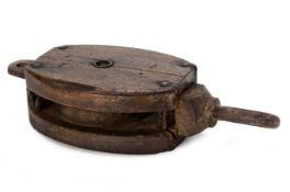 AN ANTIQUE MARITIME PULLEY