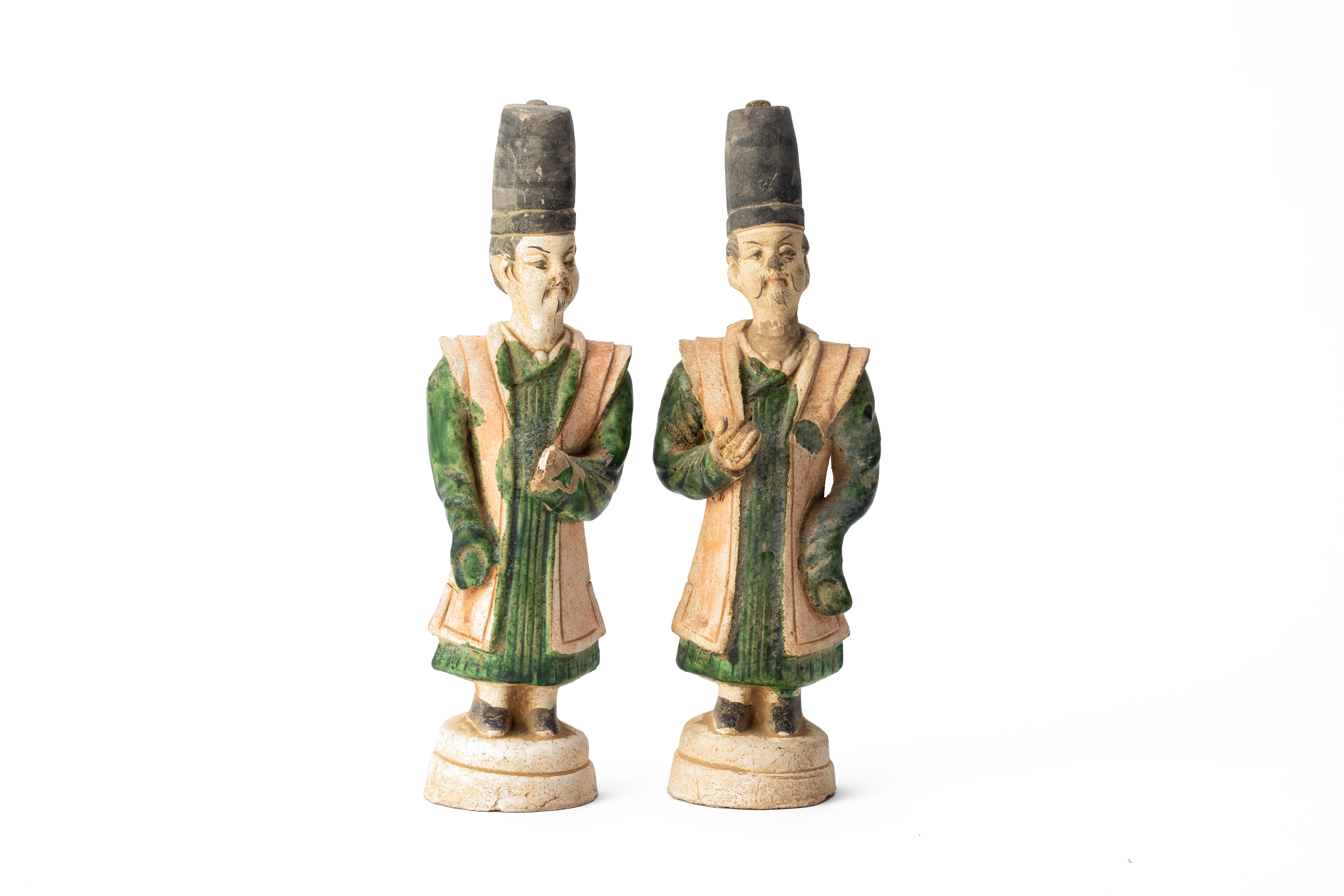 A PAIR OF ORIENTAL POTTERY FIGURES