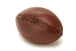 A VINTAGE LEATHER RUGBY BALL