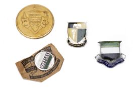 A GROUP OF VINTAGE RAFFLES SCHOOL BADGES