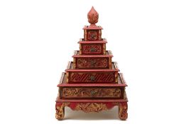 A PERANAKAN CARVED RED & GILT FIVE-TIERED BOX