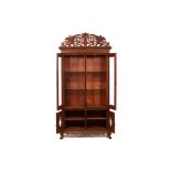 A PERANAKAN CARVED AND PARCEL GILT CUPBOARD / CABINET
