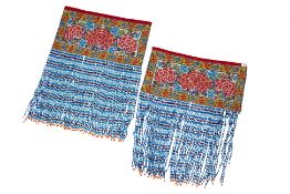 A PAIR OF BEADED PANELS WITH TASSELS