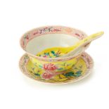 AN UNUSUAL PERANAKAN YELLOW-GROUND BOWL, PLATE AND SPOON SET