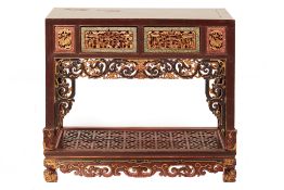 A PERANAKAN CARVED AND PARCEL GILT SIDE CABINET