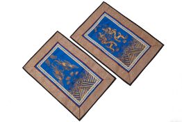 A PAIR OF BLUE SILK EMBROIDERED PANELS