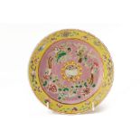 A PERANAKAN 'IN-AND-OUT' ENAMELLED PINK-GROUND PLATE