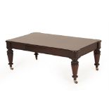 A STAINED WOOD COFFEE TABLE
