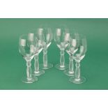 A SET OF SIX LALIQUE CRYSTAL WINE GLASSES