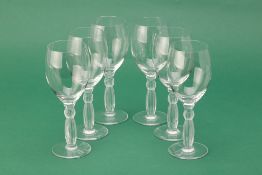 A SET OF SIX LALIQUE CRYSTAL WINE GLASSES