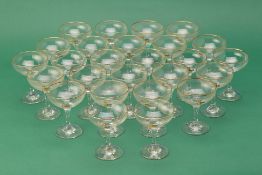 TWENTY-SIX BABYCHAM GLASSES