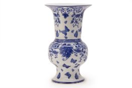 A BLUE AND WHITE BEAKER OR 'GU' VASE