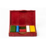 A VINTAGE GUCCI RED LEATHER POKER SET