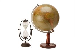 AN ADLER ERDGLOBUS ROTATING GLOBE AND A SAND TIMER