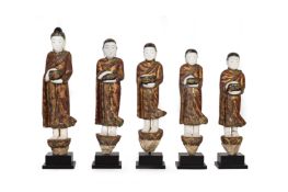 A SET OF FIVE ALABASTER BURMESE MONKS