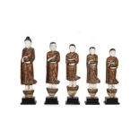 A SET OF FIVE ALABASTER BURMESE MONKS