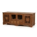 A LARGE RUSTIC SIDEBOARD