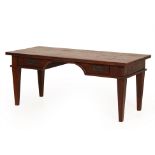 A LARGE OAK WRITING DESK