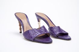 A PAIR OF GUCCI PURPLE CROCODILE SLIDE KITTEN HEELS EU 37