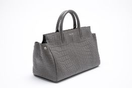 A SAINT LAURENT GREY CROCODILE EMBOSSED LEATHER TOTE BAG