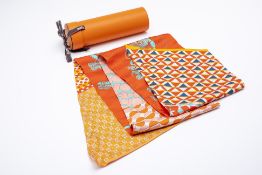 A HERMES MAXI TWILLY CUT SILK SCARF