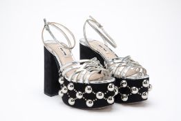 A PAIR OF MIU MIU STUDDED METALLIC PLATFORM HEELS EU 37