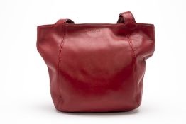 A COACH RED LEATHER TOTE BAG
