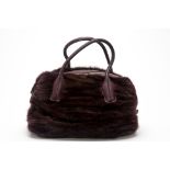 A TOD'S FAUX FUR HANDBAG