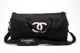 A CHANEL BLACK VIP DUFFLE BAG