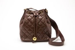 A CHANEL BROWN QUILTED BUCKET BAG