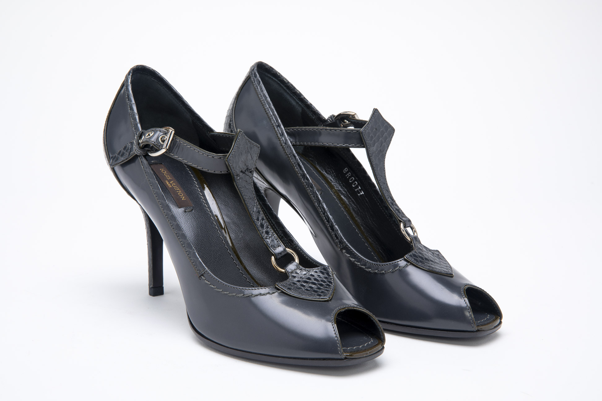 A PAIR OF LOUIS VUITTON CHARCOAL LEATHER HEELS EU 38.5