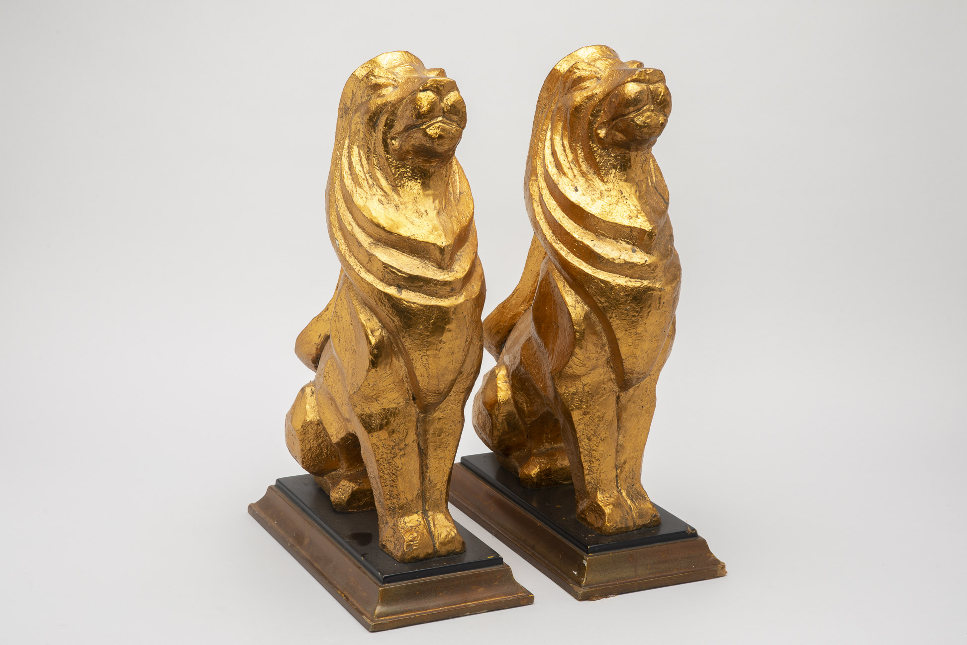 A PAIR OF GILTWOOD MODELS OF LION