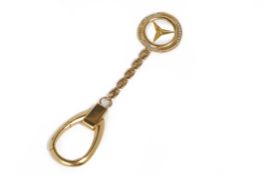 A GOLD & DIAMOND MERCEDES -BENZ KEY CHAIN